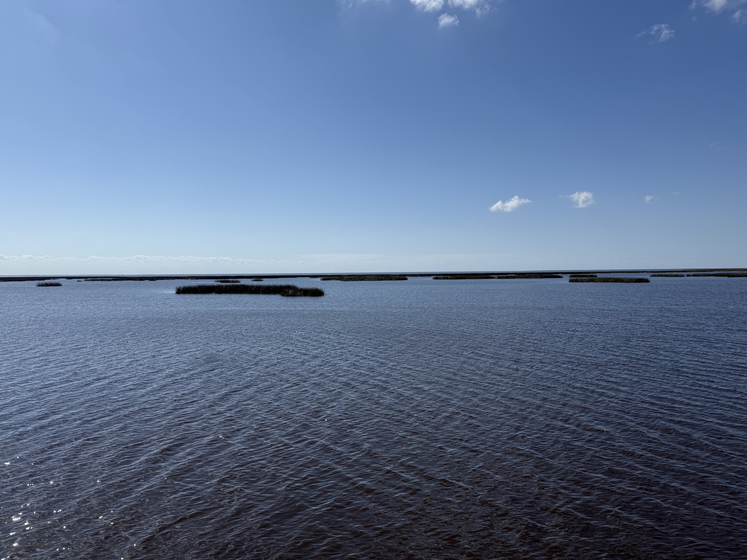 Expansive view of Lake Okeechobee looking south from the fishing pier at Lake Okeechobee Park in Okeechobee, Florida