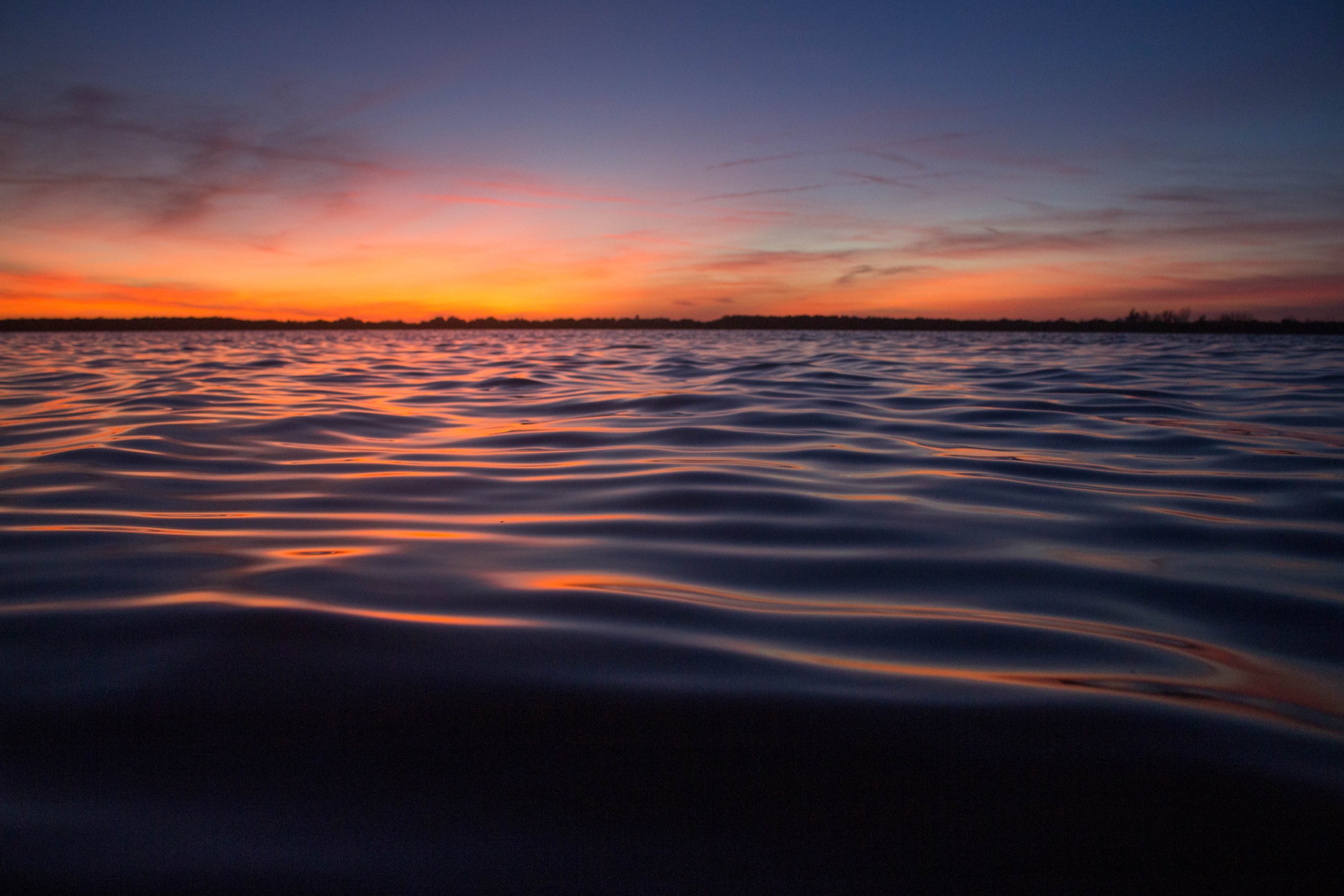 Calm shallow Tampa Bay water at dusk near Tierra Verde and Shell Key